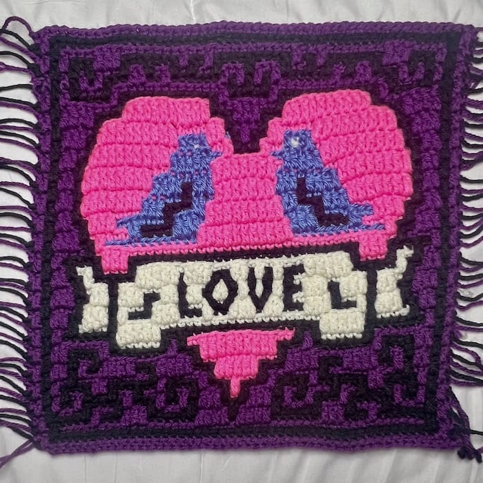 tattoo-themed square in purple and pink with a heart, birds, and "love" banner