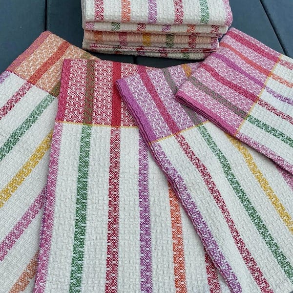 woven tea towels in white with candy-colored vertical stripes 